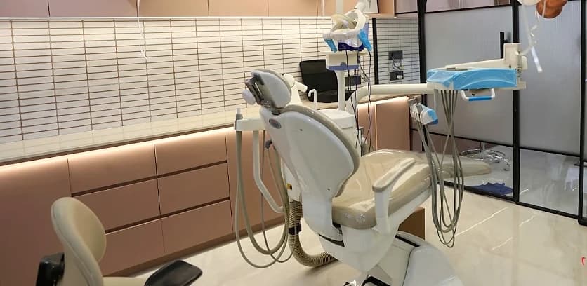 Treatment room at V-Dent Dental Care with a dental chair and delivery unit, New Nikol, Ahmedabad